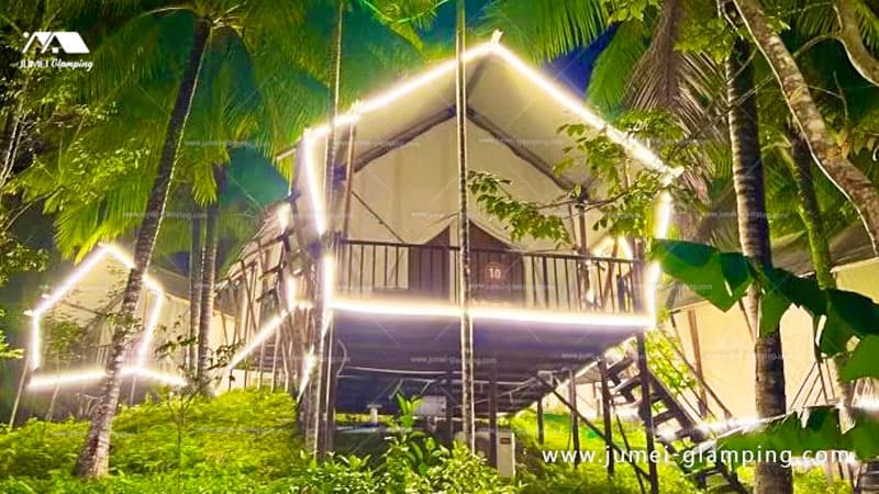 safari tents in the coconut tree forest